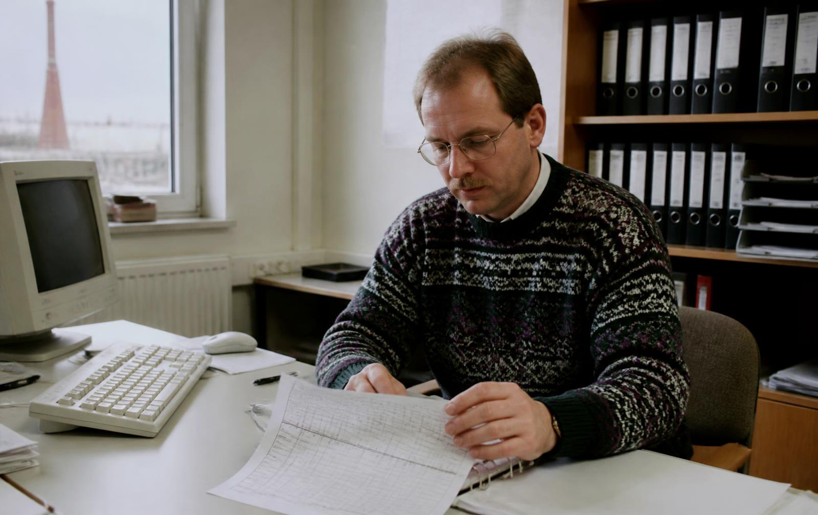 Softwarekarton neben einer handgezeichneten Prozessskizze – individuelle Software